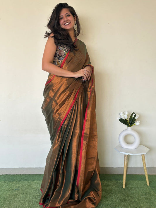 Sukantika tissue saree in forest green